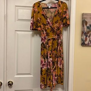 Mustard flower dress. Fits perfectly as it’s adjustable.